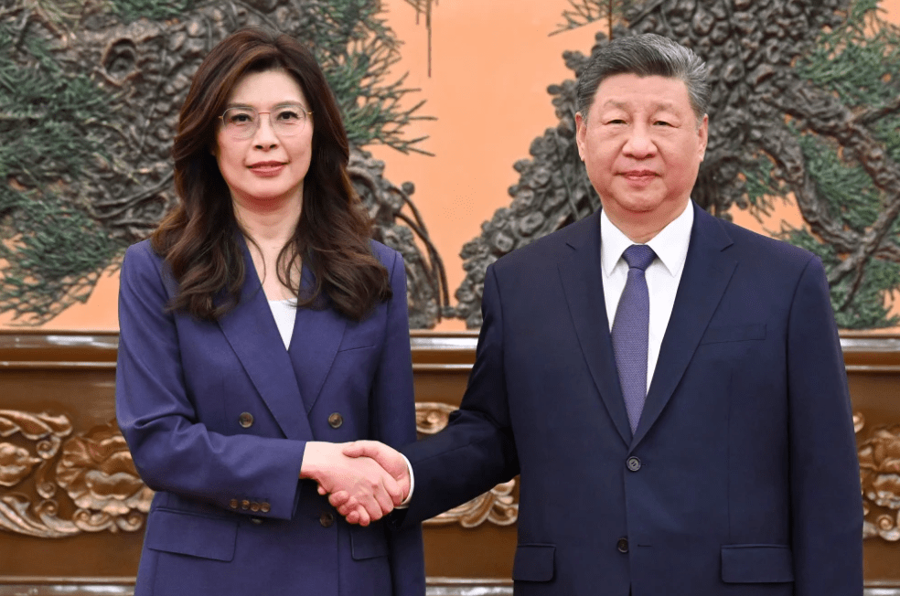 Chinese President Xi Jinping shakes hands with Taiwan’s main opposition leader, Cheng Li-wun, in Beijing on Friday.
